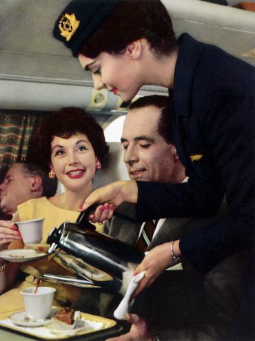 019-1957-late-EL-AL-Flight-Attendant-Serving-in-EL-AL-Britannia-from-EL-AL-Britannia-Brochure-MGGoldman-Colln-766x1024.jpg