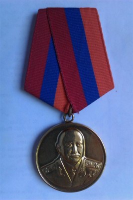 Bag 100 Medal Obv (Large).jpg